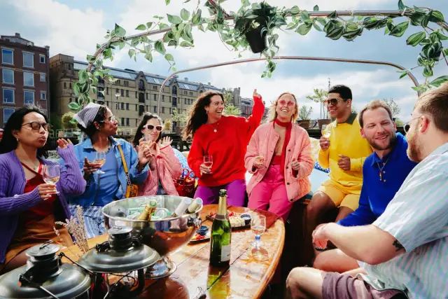 Guests toasting on a canal boat